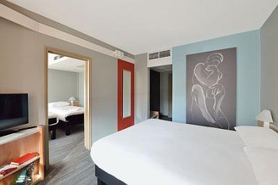 Schlafzimmer im Hotel - billiges Hotel mit Spezialangeboten - ✔️ Ibis Budapest Citysouth*** - Discounted Ibis Hotel in der Nähe des Flughafens
